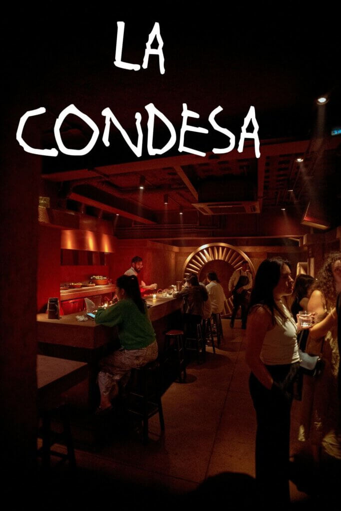 La Condesa restaurant, located in the vibrant heart of Mexico City, showcasing a lively atmosphere and exquisite cuisine.